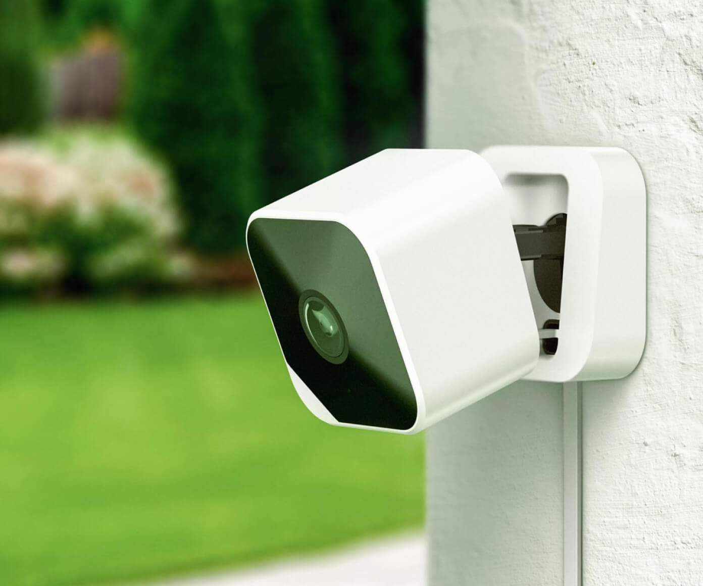 Abode Cam 2 mounted outdoors on home exterior wall