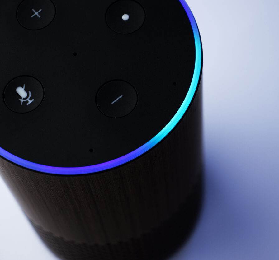 Close up of smart speaker assistant – personal assistant – blue light